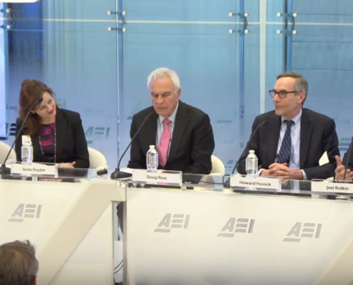 Joel Kotkin (right) moderates the discussion at the AEI Conference on Localism in America